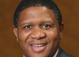 Who delivered the briefcase stuffed with cash?