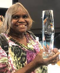 Our Daisy Ward has just won the Director General's Women of Achievement  Award at the International Women's Day breakfast in Perth. She accepted her  award in Ngaanyatjarra and English. Daisy recognised Ken