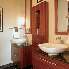 The bath side has a tub in one corner and a shower in the other. 7 Small Bathroom Layouts Fine Homebuilding