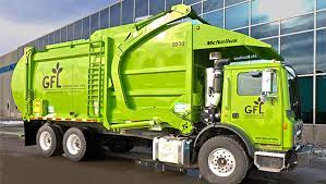 Garbage trucks von marlene targ brill bei thalia entdecken Big Green Garbage Trucks Push Rizzo To The Curb New Hauler Rolls In