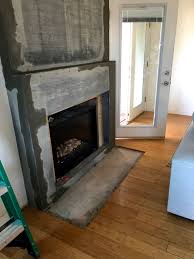Looking for finish edge to match santa barbara pacific sand tile or something close. Design Our Modern Fireplace Makeover