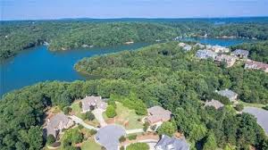 Lake Sidney Lanier Homes Blog Lake Lanier Waterfront Lot With Boat Slip Option Just Listed For Sale In Luxurious Harbour Poi Real Estate Houses Lake Boat Slip