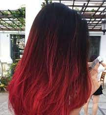 This bold long hairstyle looks completely transformed by the black and red ombre. The Latest Ombre Hair Colors And Expert Advice Hair Color Red Ombre Red Ombre Hair Red Hair Tips