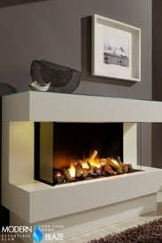 Creates an illusion of fire and smoke. Elegant White Fireplace Built With Dimplex Opti Myst Water Vapor Cassette Dimplex Electric Fireplace Electric Fireplace Fireplace