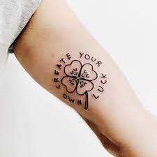 Minimalist Shamrock And Words Create Your Own Luck Tattoo Inked On The Left Arm Luck Tattoo Tattoos Shamrock Tattoos