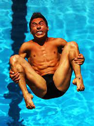 One month old baby cross eyed making a funny face. 25 Photos Showing The Funny Faces Of Olympic Divers Bouncy Mustard
