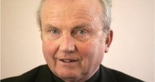 Roy Keane's father Mossie had charm and quick wit, funeral hears