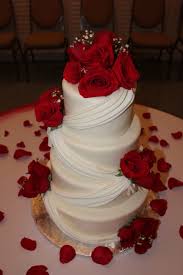 Beautiful simple wedding cake with fruits on table at wedding reception outdoors in the. Red Roses Wedding Cake Wedding Cake Red Wedding Cake Roses Silver Wedding Cake