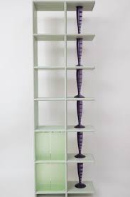 The system is composed of three joints and four panels in plastic with modular dimensions of the same depth. Lot Art Philippe Starck Kartell Shelving Unit 1 Booox Modular Bookself