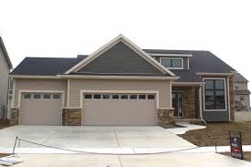 These lightweight, easy to install panels speed up installation, and boost curb appeal. Mastic Pebblestone Clay Siding With Lighter Tan Corners Exteria Dual Staggered Faux Cedar Shake Dark Siding Normal Il Blackstone Carlson Exteriors Inc