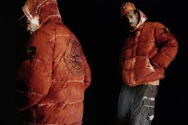 The collection consists of a studded print nuptse jacket, mountain light jacket, nuptse vest, nuptse pant, hooded sweatshirt, s/s top, base camp duffle bag, utility tote, nuptse blanket and traction mule. Supreme X Stone Island F W 2020 Dead Stock