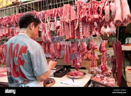 Butcher in Stanley Market, Stanley, Hong Kong Island, Hong Kong Stock Photo 