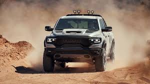 2021 Ram 1500 Trx Vs Ford F 150 Raptor Off Road Apex Predators Compared Roadshow