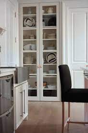 Check our collection of 27 kitchens with glass cabinets to see great ideas that will points of interest ● two ceiling mounted top glass cabinet doors ● black corian countertop with farmhouse sink ● white toe kick base cabinets ● marble island. 22 Glass Cabinets Ideas Glass Cabinet Home Home Decor