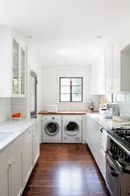 I used a kitchen socket list to hide the lower parts, installed ventilation in it, for air. 7 Ways To Sneak A Washer Dryer Into The Kitchen
