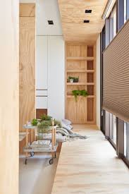 An Incredibly Compact House Under 40 Square Meters That Uses Natural Decor Compact House Plywood Interior Apartment Interior Design