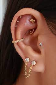 Different Multiple Helix Ear Piercing Ideas Pretty Earring Studs Hoop Rings Www Impuria Com Cool Ear Piercings Pretty Ear Piercings Cute Ear Piercings