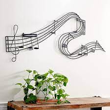 Get it as soon as thu, jul 15. Amazon Com Deco 79 90592 Music Themed Wall Decor 49 W 21 H Textured Black Finish Home Kitchen