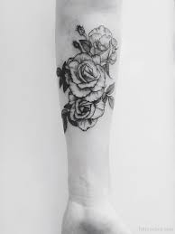 Look at these rose tattoos on arm. Rose Tattoos For Girls On Arm