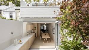 Seen over at archdaily, the imprint house now features a completely redone floor plan that moves the living areas to the rear of the house, and reconfigures the layout so that the interior spaces feel more connected with the rear yard. Modern Terraced House Renovation Idea With Double Outdoor Spaces Youtube