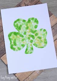Draw a x shap or 2 vertically crossed line as shown in the image. Fingerprint Shamrock Craft Easy Peasy And Fun