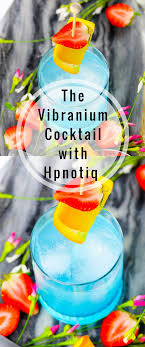 Black And Blue Drink Menu Toast To Marvel S Black Panther Movie With Our Vibranium Cocktail Made With Hpnotiq Liqueur This Hpnotiq Drink Is A Bea Hpnotiq Drinks Cocktails Blue Drinks