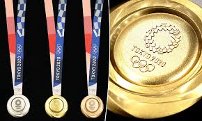This time, the olympic torch as well as medals are being made from recycled material. Tokyo 2020 Olympics Medals Made From Old Gadgets Unveiled One Year To The Day Before Games Begin Daily Mail Online