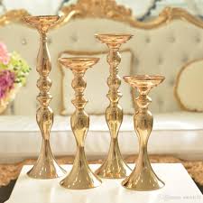 A perfect modern detail to add to your wedding décor, this tall gold geometric centerpiece or candle holder is totally on trend. Gold Wedding Centerpiece Tabletop Mental Candle Holder Tealight Candle Holder From David137 231 16 Dhgate Com