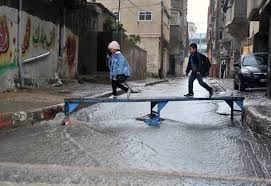 Israeli troops clash with palestinian youths. Unrwa Declares Emergency In Gaza City Due To Extreme Weather And Flooding Unrwa
