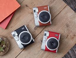 The wide film and first accompanying camera were released the following year. Instax Mini 90 Fujifilm