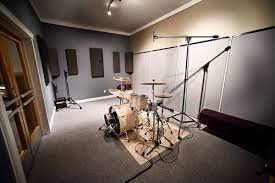 To save money on frames, use washi tape that complements your poster or print to adhere it to the wall. 8 Drum Room Ideas Drum Room Drum Room Ideas Music Studio