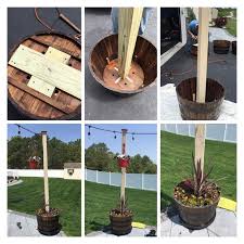 Diy Flower Baskets With Poles For Outdoor Lights Baskets Diy Flower Lights Outdoor Poles Backyard Diy Projects Diy Backyard Outdoor Backyard