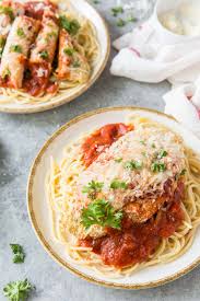 The chicken is breaded, browned, then baked to perfection with sauce and cheese. Chicken Parmesan Easy Baked Chicken Parmesan Recipe