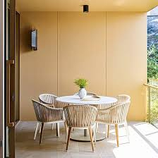 Summer Dining Meets Apartment Living With The Cayman Outdoor Dining Chair And Caledonia Outdoor Dining Outdoor Dining Table Outdoor Dining Chairs Summer Dining