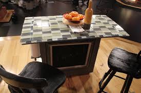 You can build a kitchen island most simply with two kitchen base cabinets and a blank of butcher block material. Diy Dresser Kitchen Island The Owner Builder Network