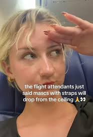 the flight attendants just said mascs with straps will drop from the  ceiling ၂၁