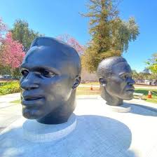 The iconic Pasadena Robinson Memorial, located at 95 N Garfield Ave across  from City Hall, is looking clean and fresh following recent artwork  conservation. The monumental bronze sculptures depicting Mack and Jackie