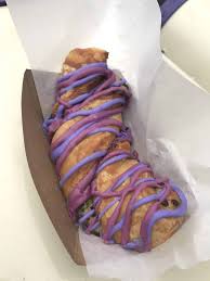 The cheshire cat has mysterious powers the cat's fur is striped purple and pink, a pattern that stops abruptly at his wrists and ankles. Review Cheshire Cat Tails Cold Brew Coffee Magically Appear At Cheshire Cafe At The Magic Kingdom Wdw News Today