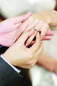 Close Up On Hand Of A Man Put On An Engagement Ring On The Finger Of The Bride Weddingring Wedding Rings Wedding Rings For Women Engagement Rings On Finger