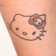 Hello kitty has been an adorable fixture in our pop culture for the last 40 years and fans have been while creating this gallery of hello kitty tattoos we were amazed by the originality in the designs and. 10 Celebrity Hello Kitty Tattoos Steal Her Style