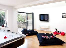 12 Fantastically Fun Game Room Ideas Hunker Lounge Room Design Boys Game Room Game Room Decor