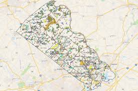 This map shows 16 connected tracts of land located in springfield, haycock and rock hill townships, each with the purchaser's name and warrant, survey, and patent dates of original purchases, as well as names and citations for later transfers. Bucks County