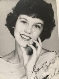 Tge little girl at the front is my mother in law and she is 80 now. Can  someone colorize this? She remembers that tge dress was light green. Tia