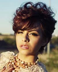If your natural hair is a bit straight, whip out that curling wand and add a few curls. Best Curly Short Hairstyles For Round Faces