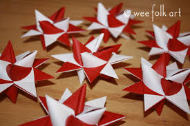 It's a popular tradition to fill up glass jars with these lucky stars. German Stars Wee Folk Art