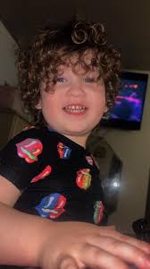 How to manage and bring out curly hair in a child?