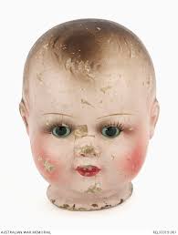 Hush-a-Bye doll's head with patent wooden eyes : Laurie Cohen