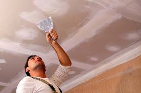 Repairing Cracks And Dents In A Ceiling With Skim Interior Wall Paint Plaster Repair