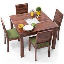 Collins dining chair collins dining chair is designed with a classic retro chic feel and comes finely upholstered in velvet, supported by tapered glossy black legs with rich accents of polished brass. All 4 Seater Dining Table Sets Check 69 Amazing Designs Buy Online Urban Ladder