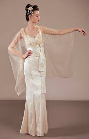A Mermaid Shaped Skirt With A Slimming Corset Like Obi Belt And Ethereal Kimono Combine To Compli Japanese Wedding Dress Bridal Outfits Wedding Dresses Unique